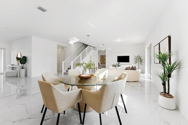 dining area with a wealth of natural light