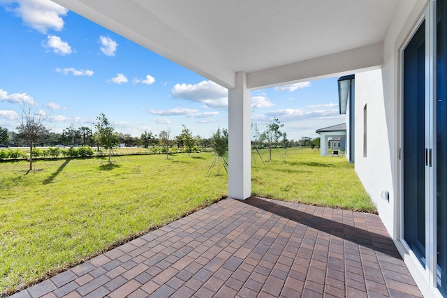 view of patio / terrace with a rural view