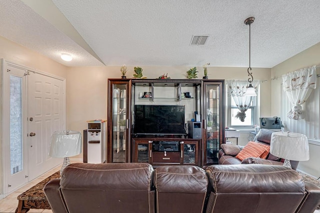 living room with a textured ceiling