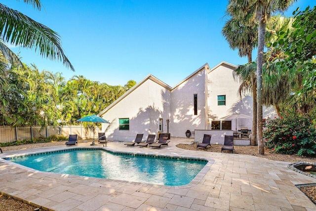 view of swimming pool featuring a patio