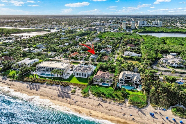 bird's eye view featuring a view of the beach and a water view