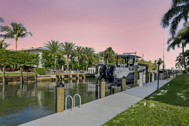 view of dock with a water view and boat lift