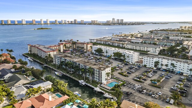 birds eye view of property featuring a water view