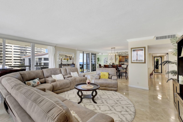 living room featuring crown molding