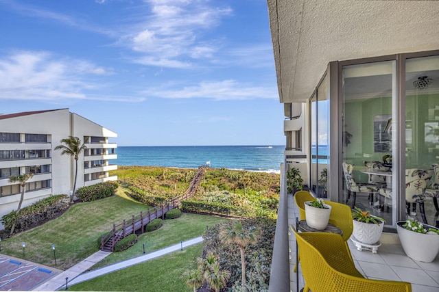 property view of water featuring a beach view