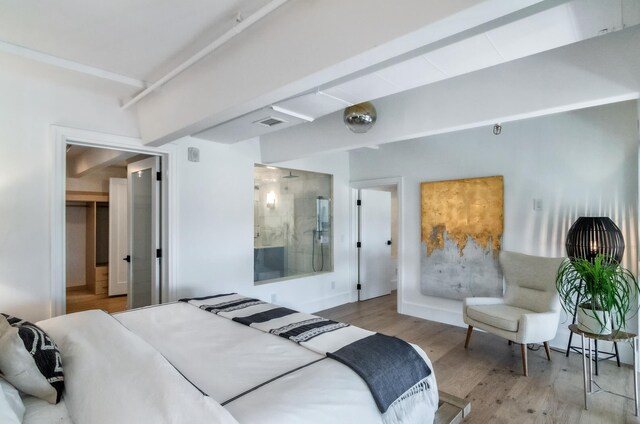 bedroom with light hardwood / wood-style flooring