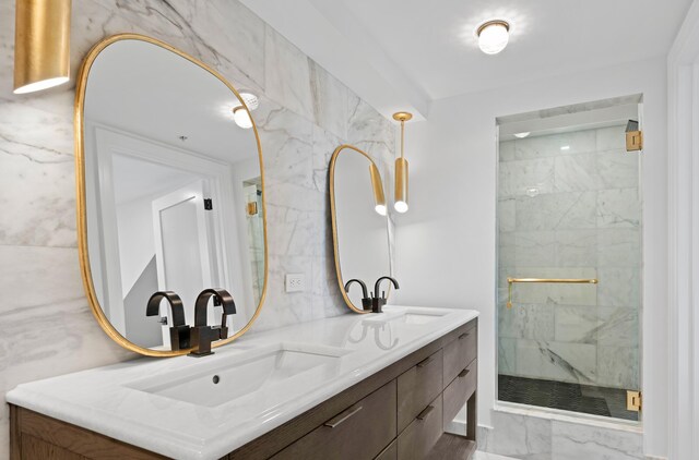 bathroom featuring vanity and walk in shower