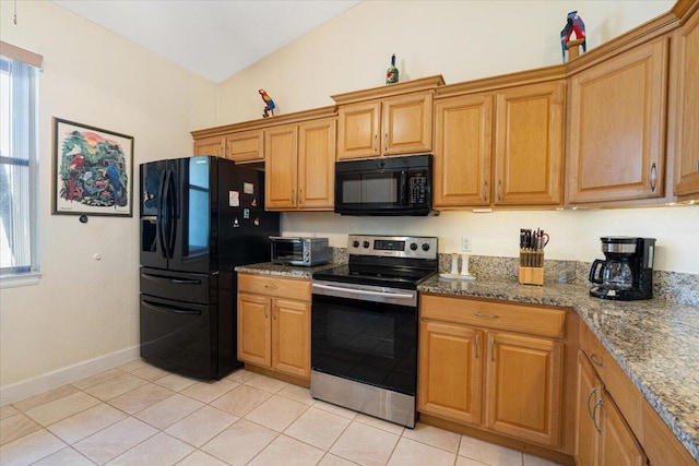 kitchen with black appliances, light tile patterned flooring, lofted ceiling, and stone counters