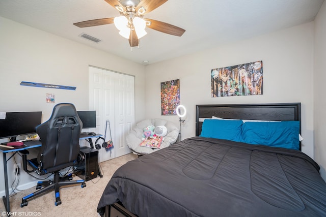 bedroom featuring carpet flooring, a closet, and ceiling fan