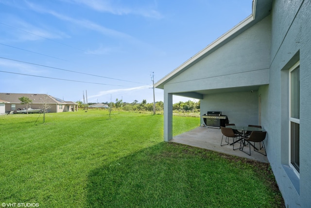 view of yard with a patio