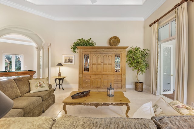 tiled living room featuring ornate columns, crown molding, and billiards