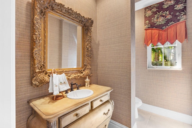 bathroom with tile patterned floors, vanity, and toilet