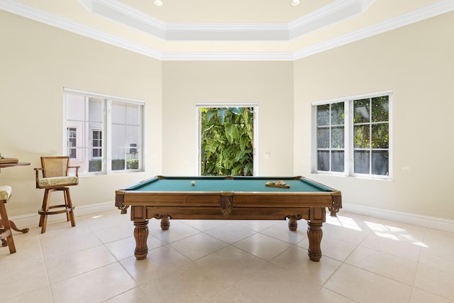 game room featuring plenty of natural light, a raised ceiling, light tile patterned floors, and billiards