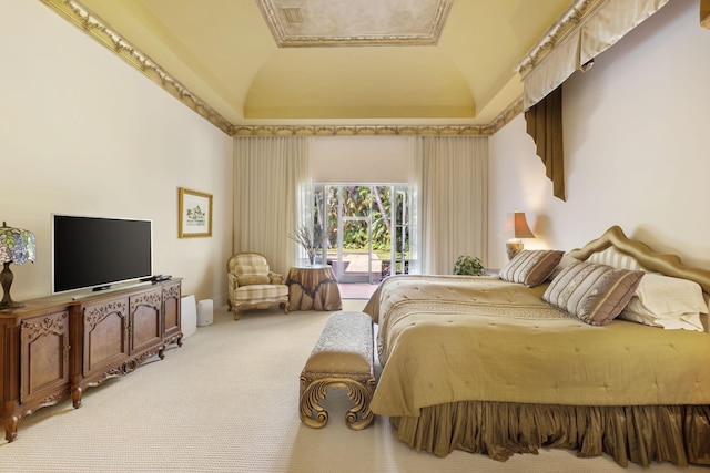 carpeted bedroom with access to outside and vaulted ceiling