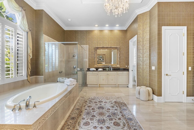 bathroom featuring vanity, separate shower and tub, ornamental molding, and an inviting chandelier