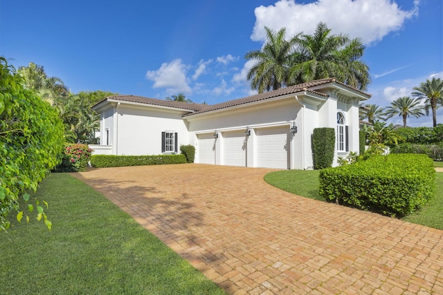 view of front of home with a garage