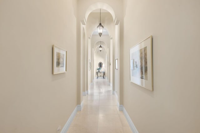 hallway with light tile patterned floors