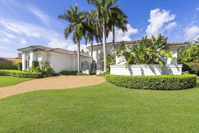 view of home's exterior featuring a yard