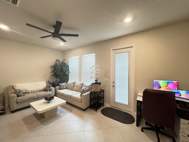 living room featuring ceiling fan