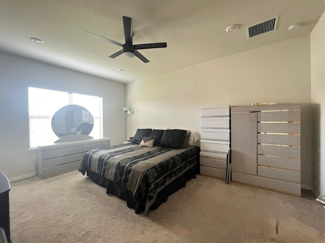 carpeted bedroom featuring ceiling fan