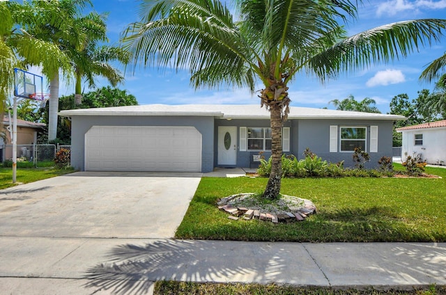 ranch-style house with a front yard and a garage