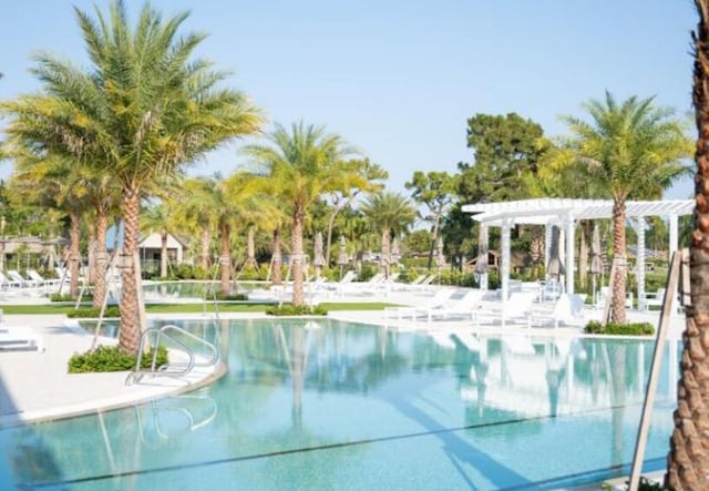 view of pool featuring a pergola