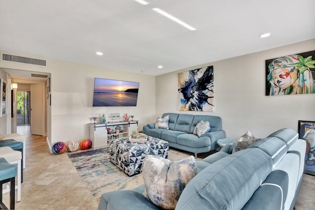 living room with visible vents and recessed lighting