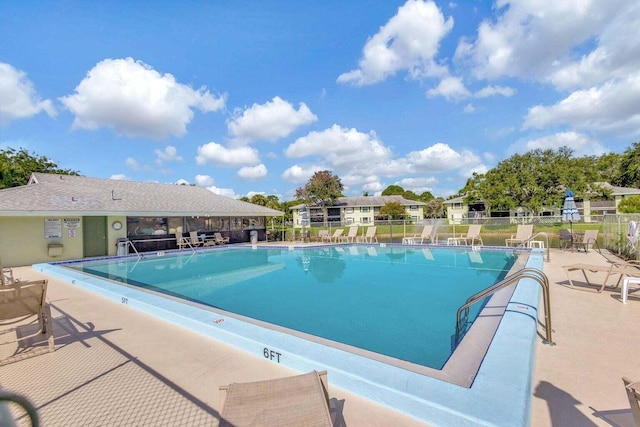 view of pool featuring a patio