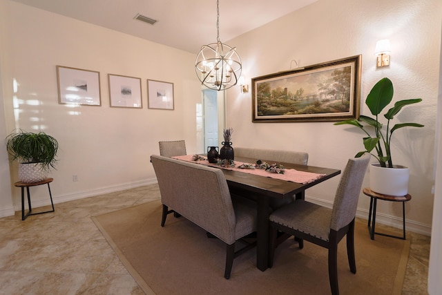 dining space featuring a chandelier