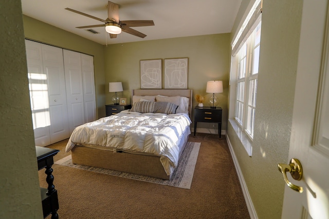 bedroom featuring ceiling fan, carpet floors, and a closet