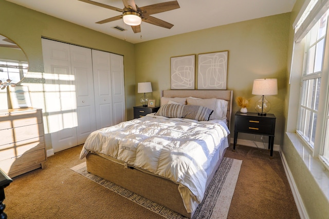 bedroom with carpet flooring, ceiling fan, and a closet