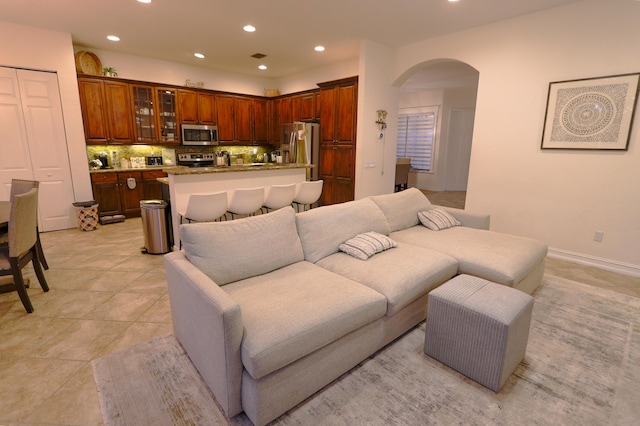 living room with light tile patterned floors