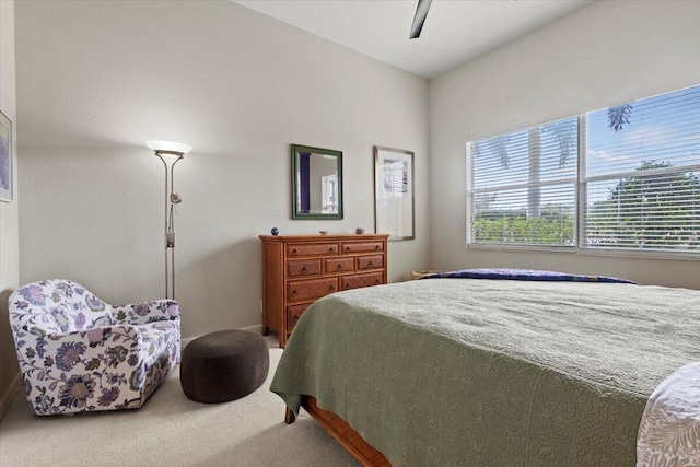 bedroom featuring ceiling fan and carpet floors