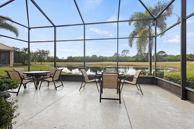 sunroom with a water view