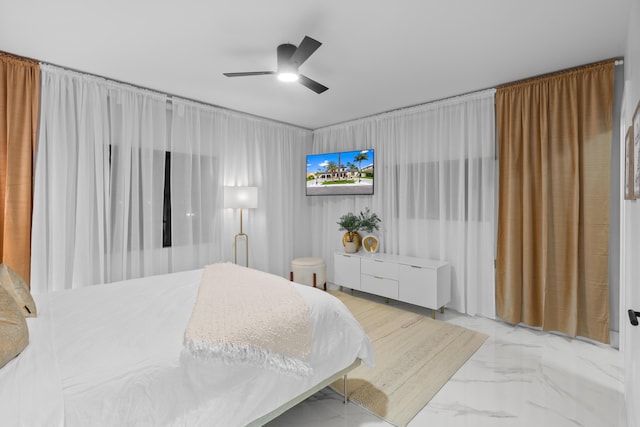 bedroom featuring ceiling fan