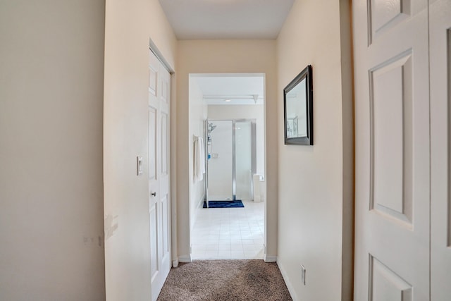 corridor with carpet floors