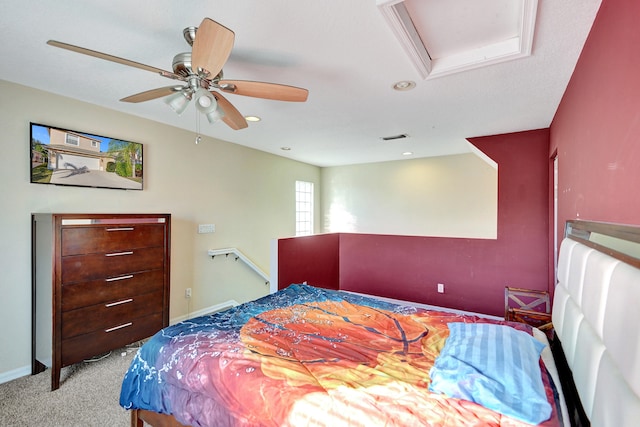 bedroom with ceiling fan and light carpet