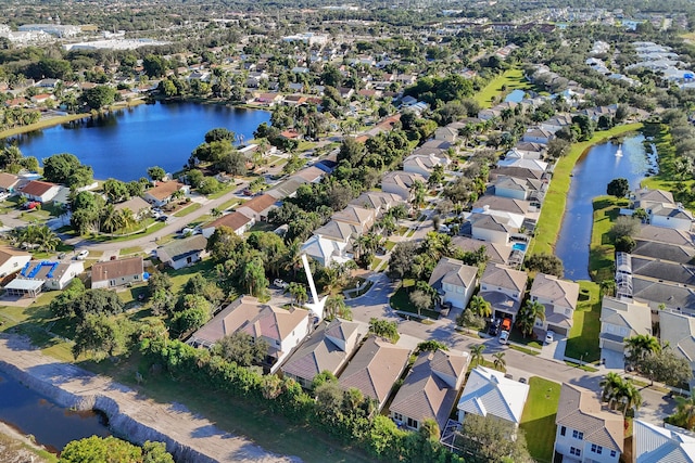 drone / aerial view with a water view