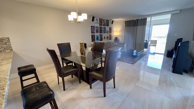 dining area with expansive windows and a notable chandelier