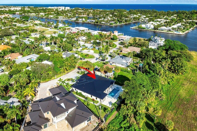 drone / aerial view with a water view