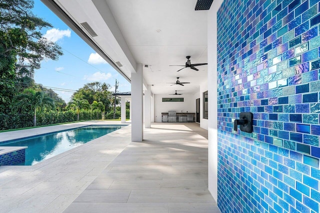 view of pool featuring a patio