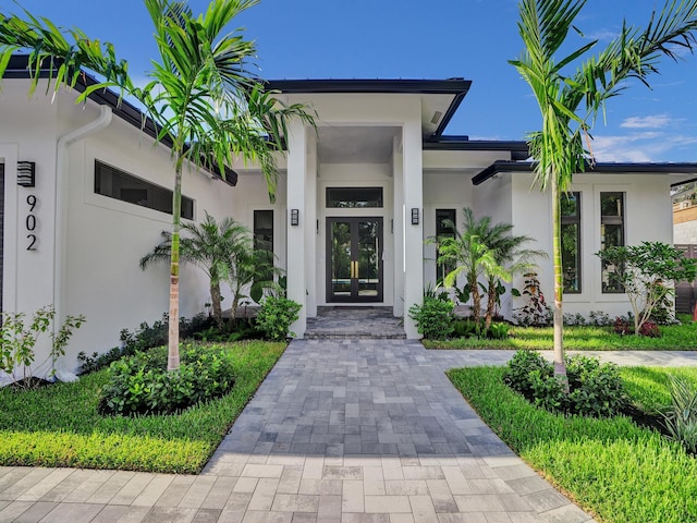 property entrance featuring french doors