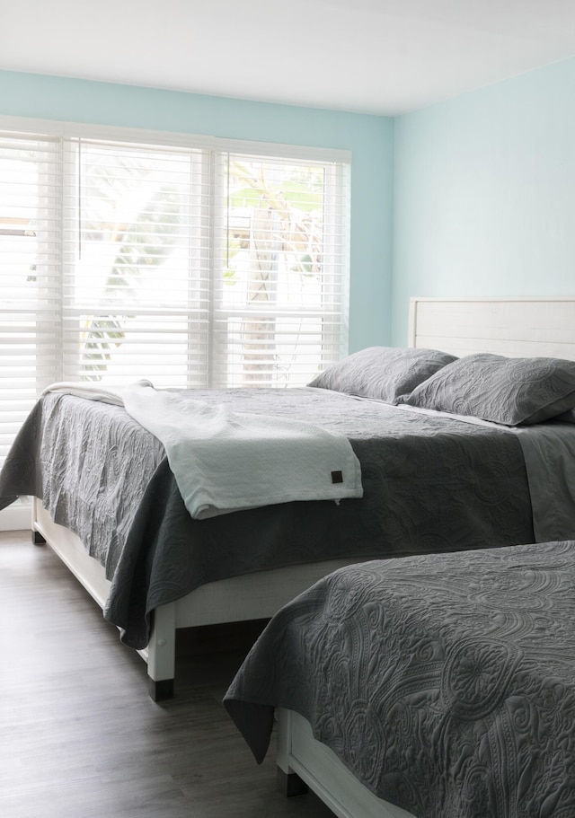 bedroom featuring beam ceiling