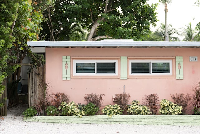 doorway to property featuring a patio area