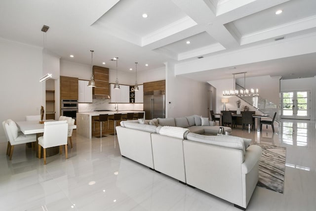 tiled living room featuring coffered ceiling, a notable chandelier, french doors, crown molding, and beamed ceiling