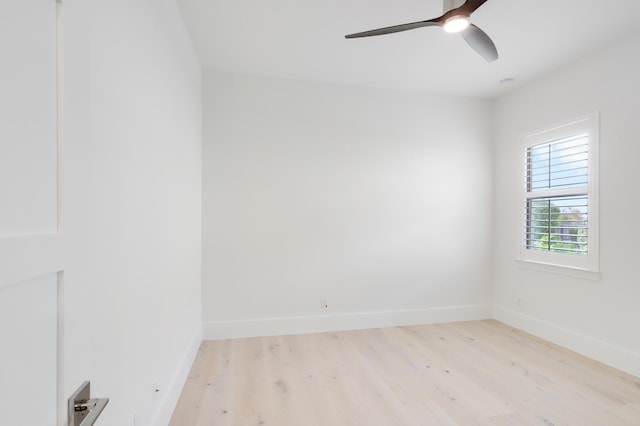 unfurnished room with ceiling fan and light wood-type flooring