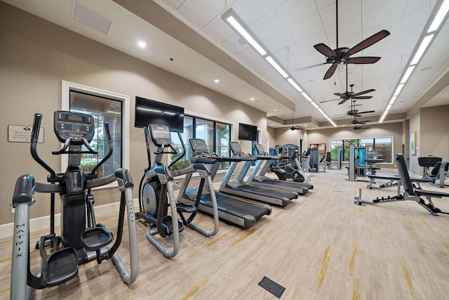 workout area featuring light wood-type flooring