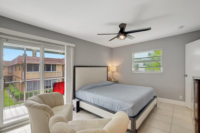 bedroom with access to exterior, ceiling fan, and light tile patterned flooring