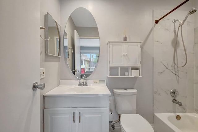 full bathroom featuring vanity, toilet, and tiled shower / bath