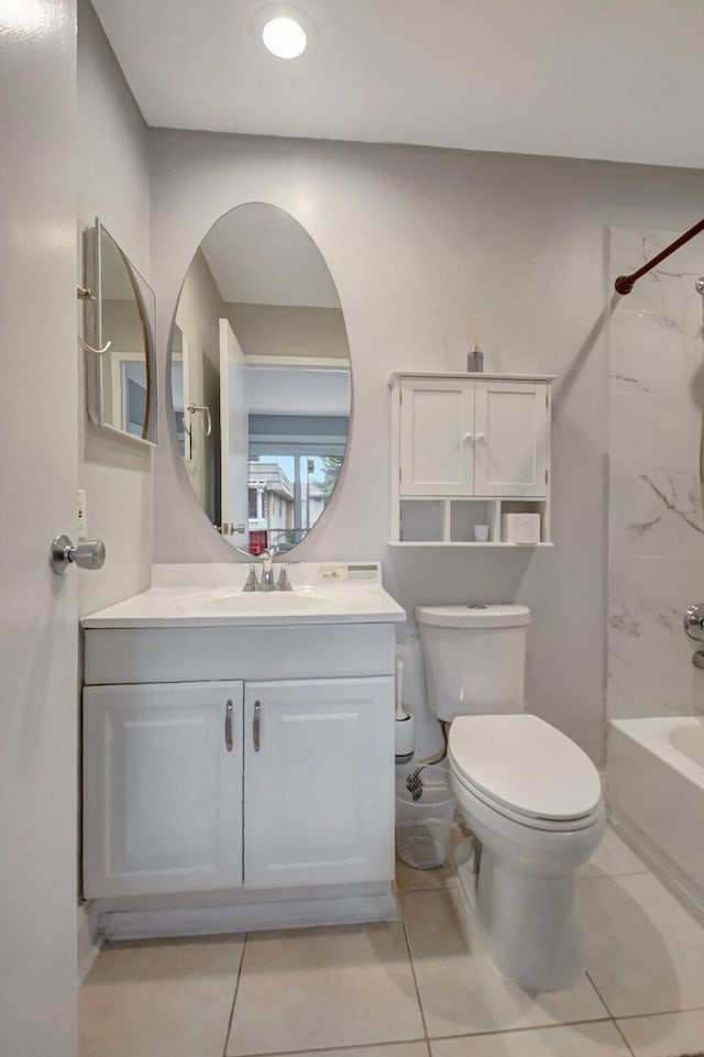 full bathroom with tile patterned flooring, vanity, bathing tub / shower combination, and toilet